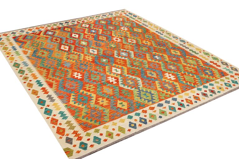 A Kilim carpet, c. 303 x 256 cm.
