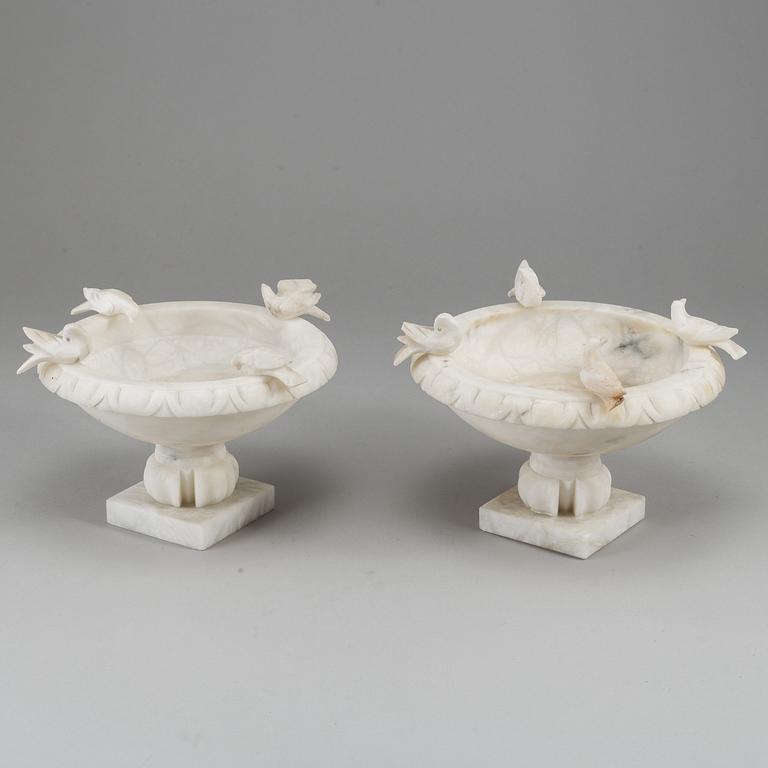 A pair of 20th century alabaster bowls or birdbaths.