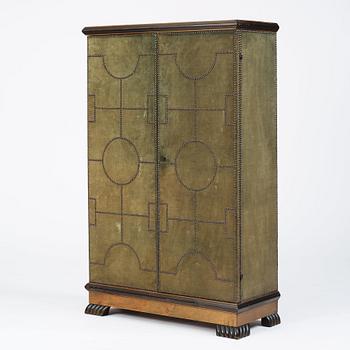 Otto Schulz, a velvet covered Swedish Modern cabinet, Sweden, late 1920s.