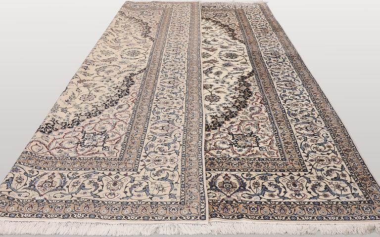 A Nain part silk carpet, 407 x 304 cm.