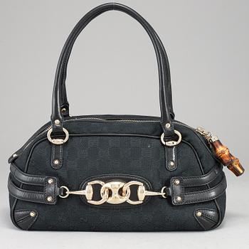 GUCCI, 'GG Canvas Horsebit Wave Handbag'.