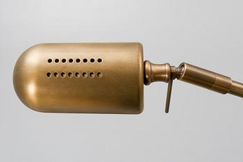 A pair of brass floor lamps 21 st century.