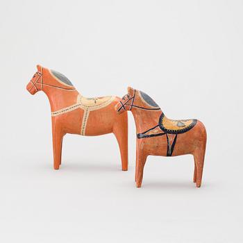 Two painted folk art dala horses first half of the 20th century.