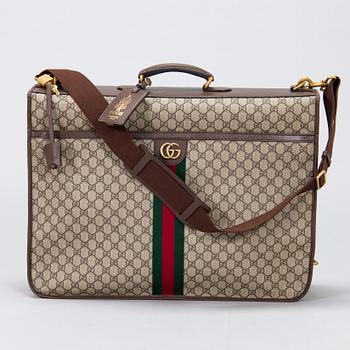 Gucci, a 'Savoy' garment bag.