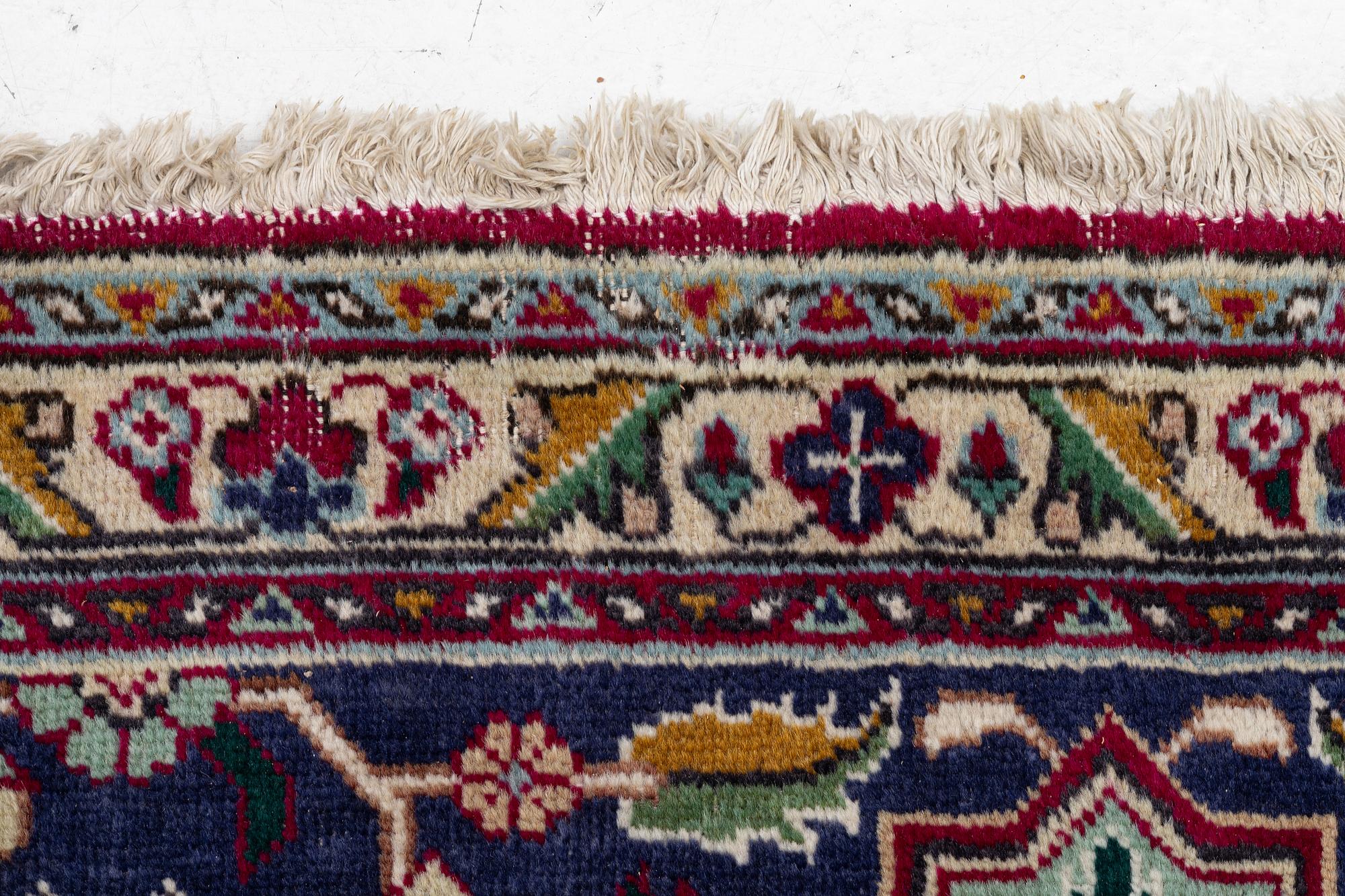 Carpet, Tabriz. Approx. 392 x 295 cm.