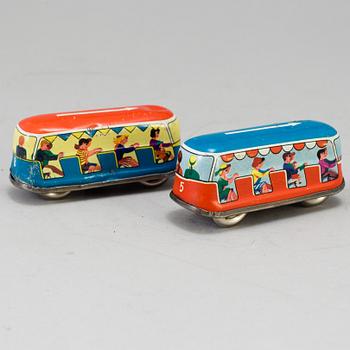 A 1960's  German toy car track with two mechanic buses.