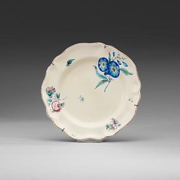 1391. A Swedish Marieberg faience plate, dated 21/8 (17)64.