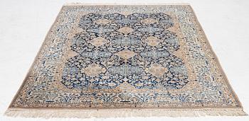 A semi-antique Nain carpet, part-silk, c. 261 x 175 cm.