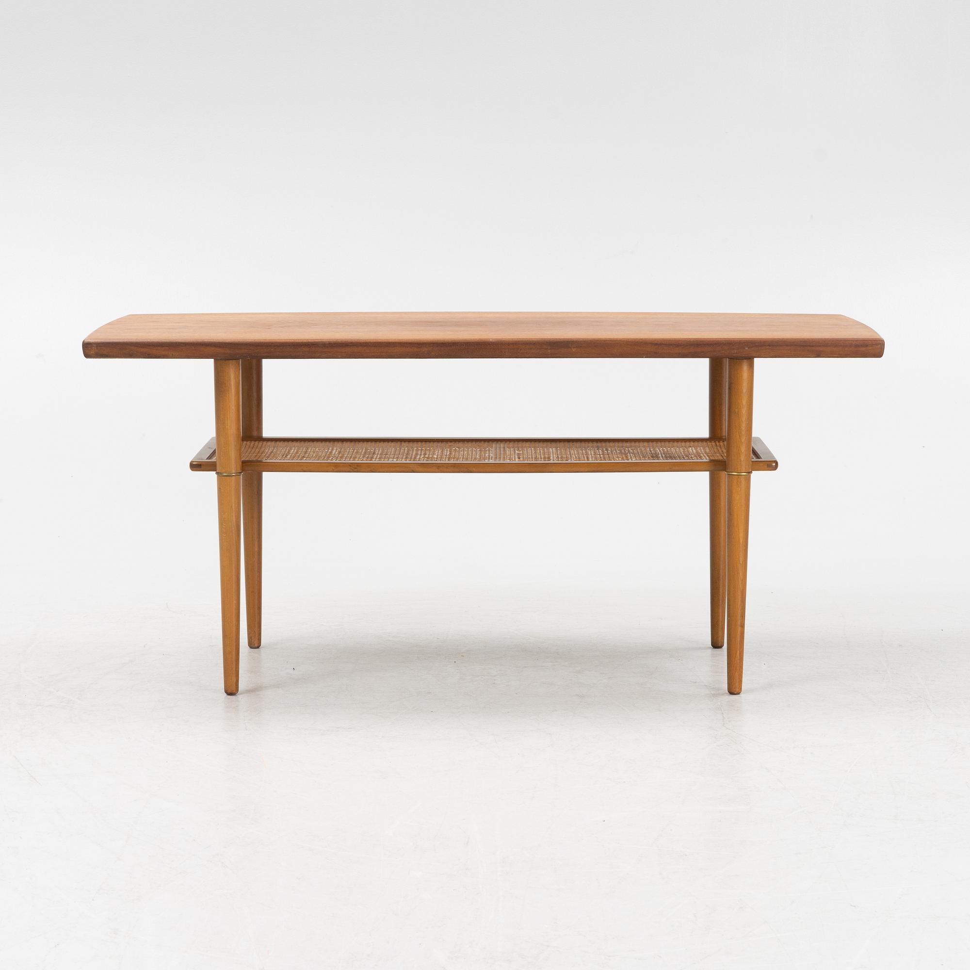 A 1960s teak coffee table.