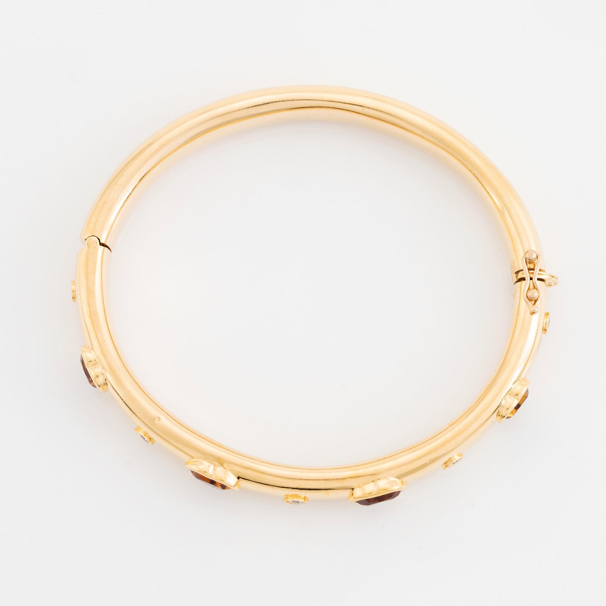Armring 18K guld med hjärtformade citriner och runda briljantslipade diamanter, David Morris.