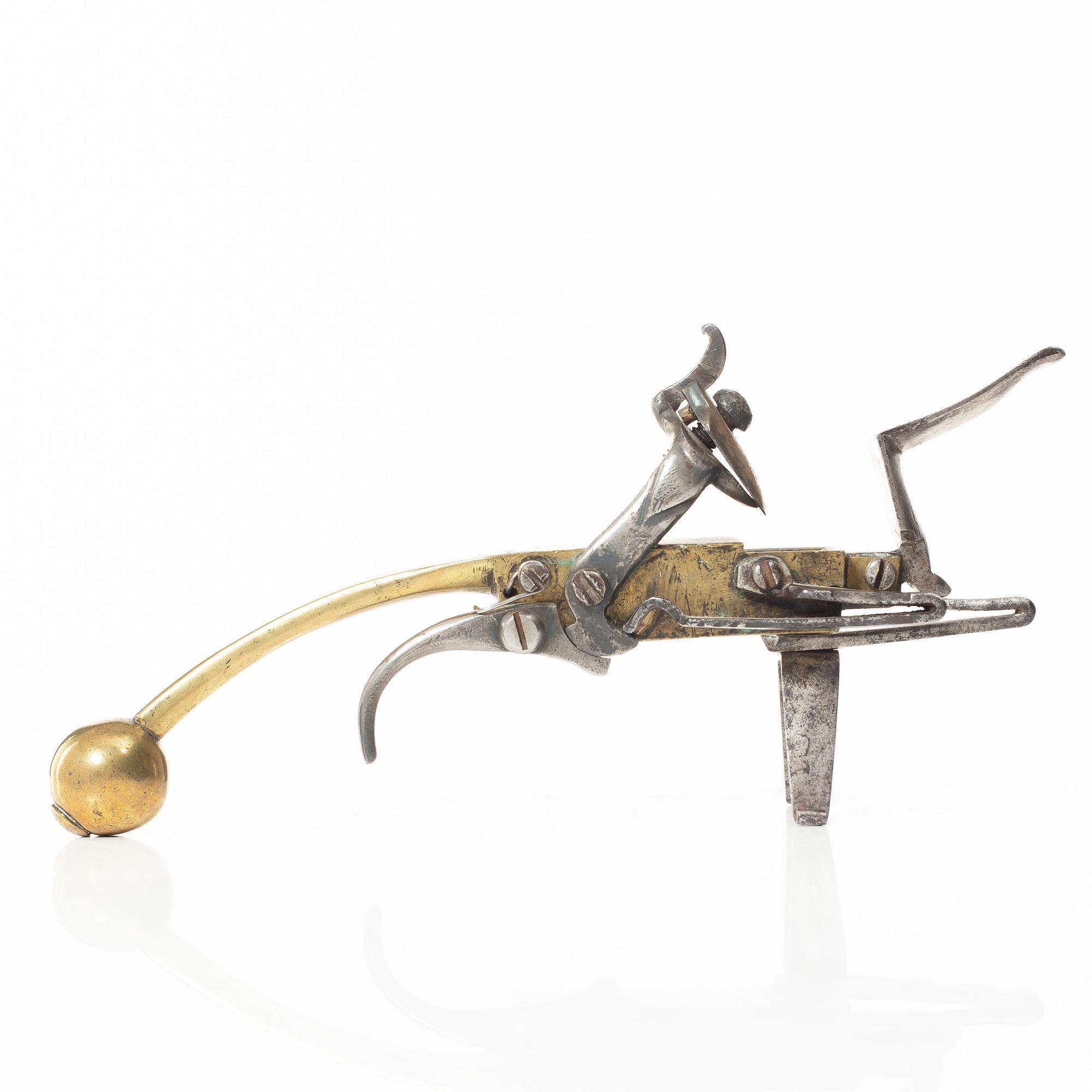 A Northern European flintlock lighter, mid 18th century.
