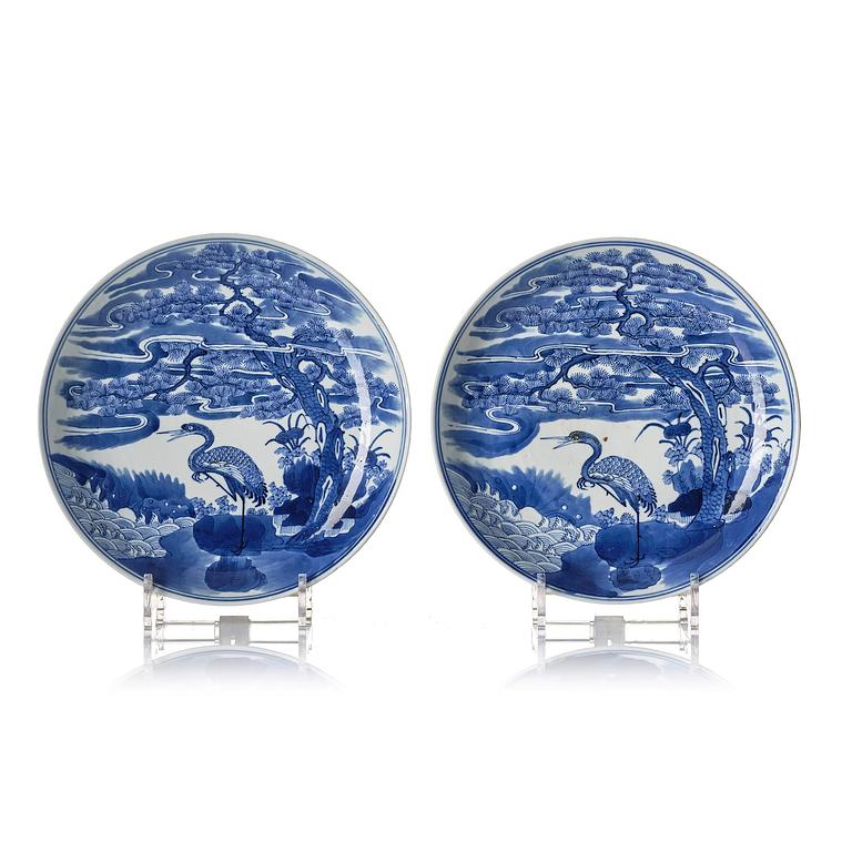 A pair of blue and white 'crane' dishes, Qing dynasty with Guangxu mark and of the period (1875-1908).