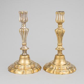 A pair of argent haché candlesticks, mid 18th century.