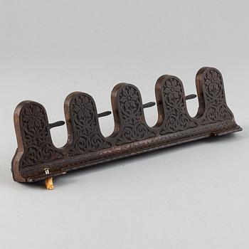 A 19th century iron umbrella and walkingstick holder.
