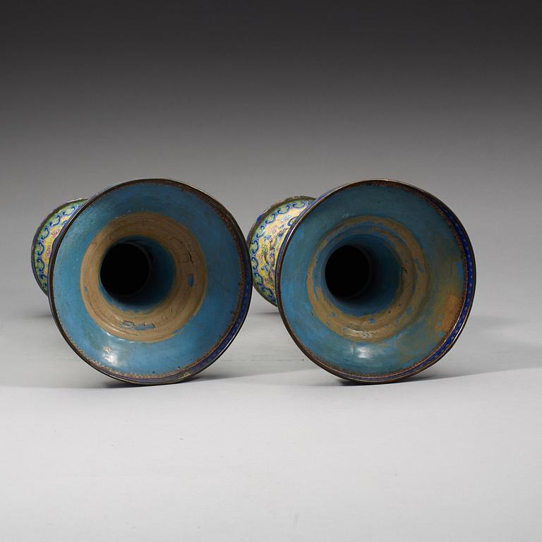 A pair of enamel on copper vases, Qing dynasty, 19th Century.