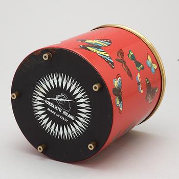 A Piero Fornasetti wastepaper bin, Milan, Italy.