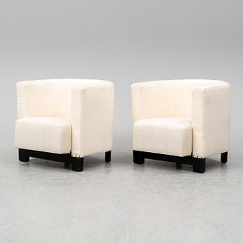 A pair of Italian easy chairs, late 20th Century.