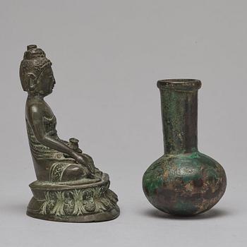 A Tibeto Chinese figure of buddha, 19th Century. A bronze vase, Ming dynasty or older.