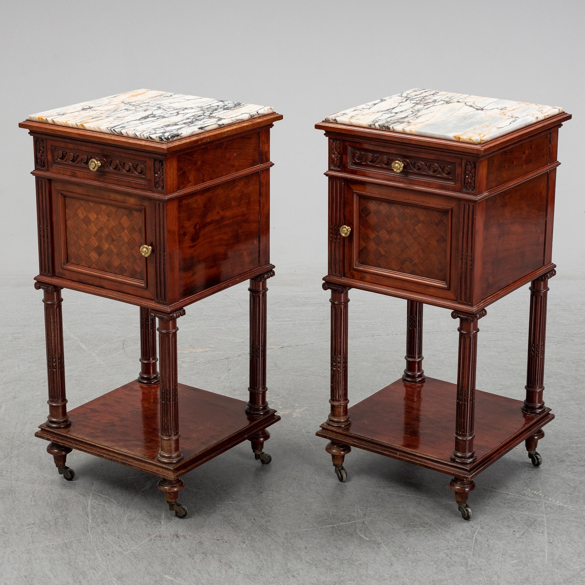 A pair of eclectic 20th century bedside tables.
