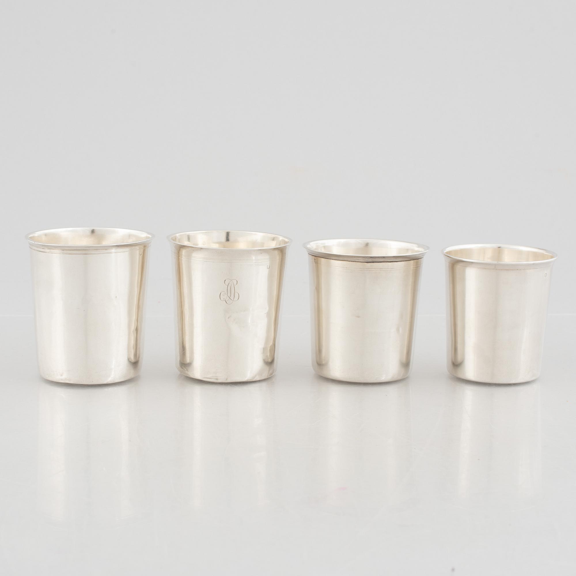 Four French silver beakers, Paris, 19th Century.