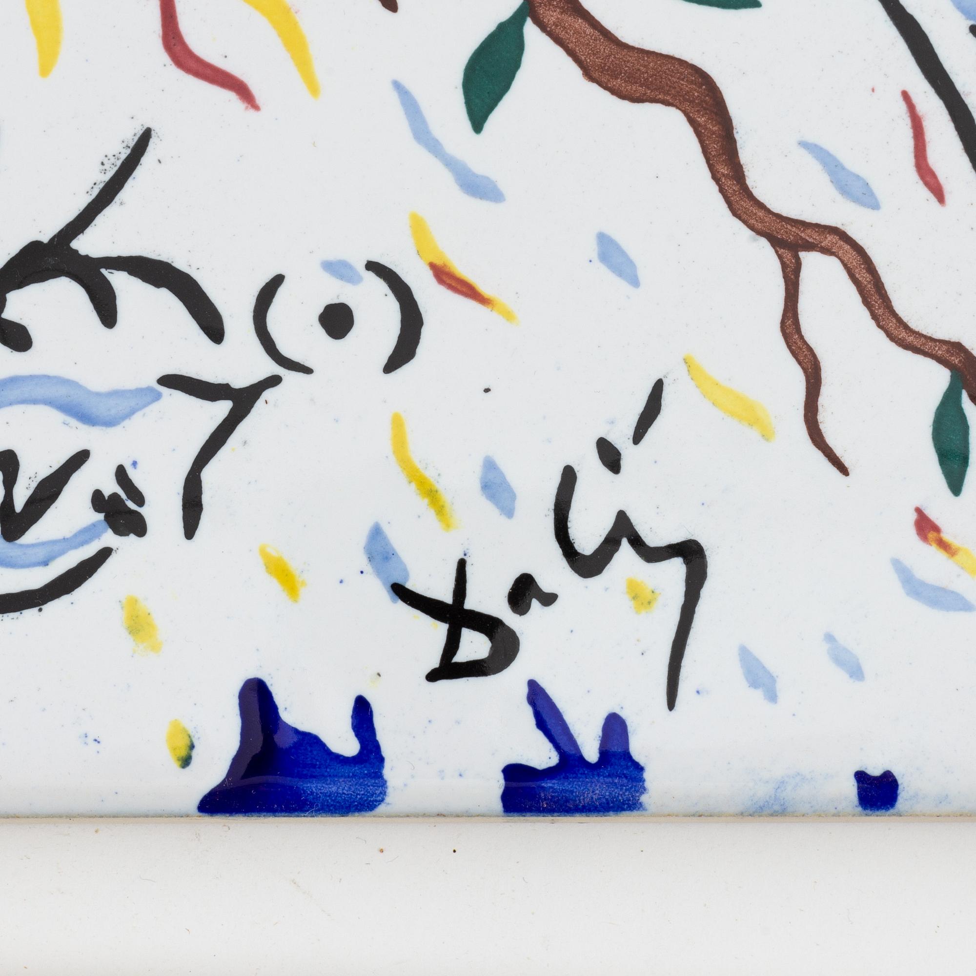 A set of six earthenware tile plates, after Salvador Dalí, late 20th century.