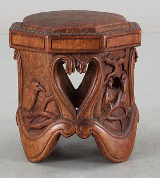 An Art Noveau sculptured pine stool probably by Knut Fjaestad, Sweden early 1900's.