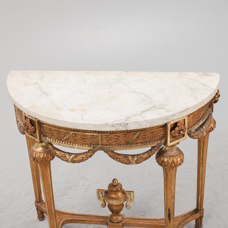 A Gustavian giltwood and marble console table, late 18th century.