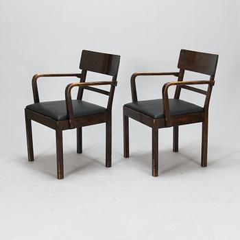 A pair of 1930's armchairs.