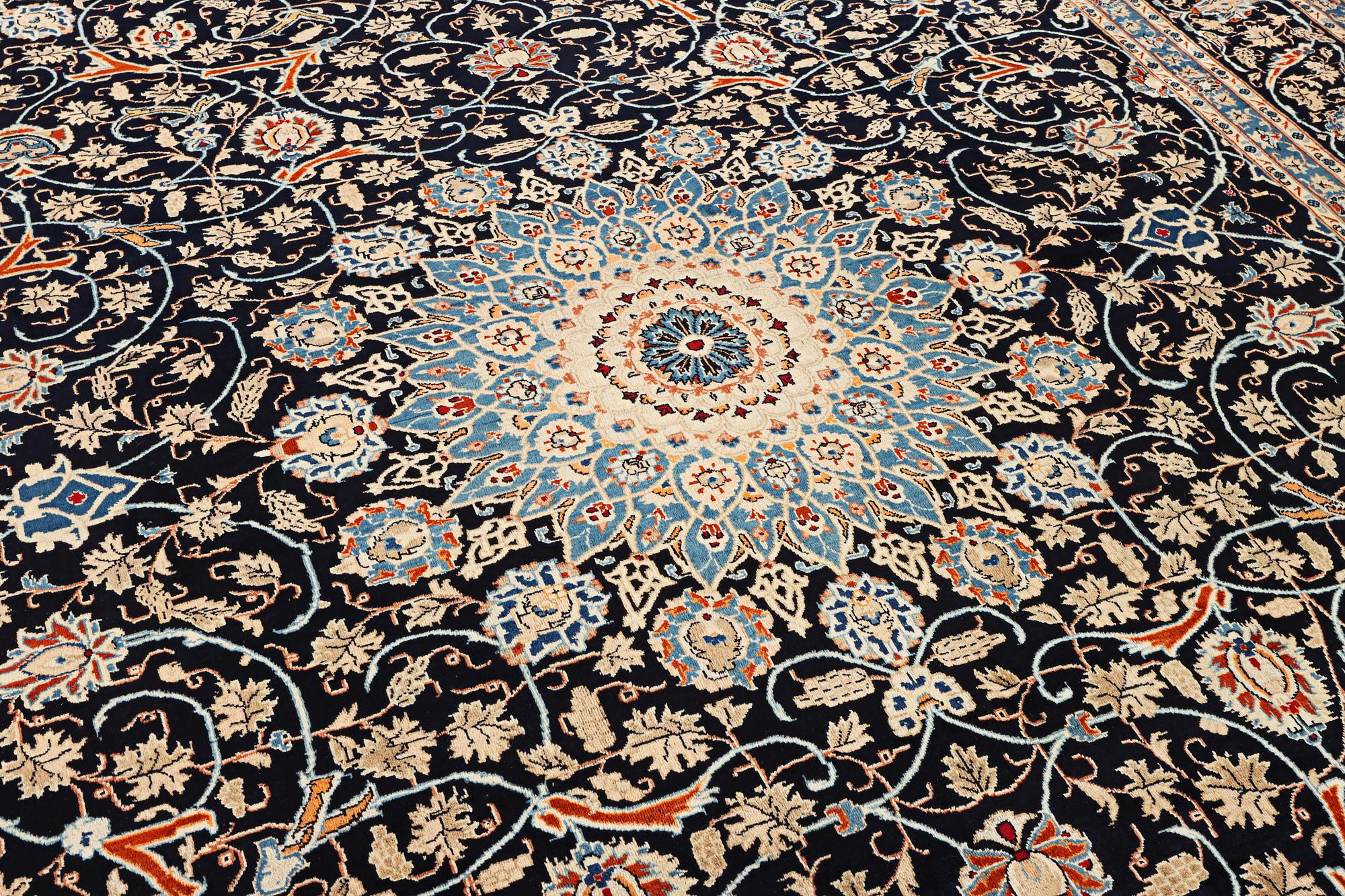 A Kashan carpet, c. 397 x 300 cm.
