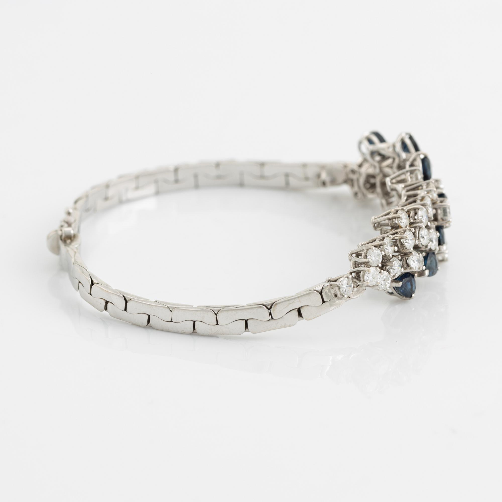 Armband, vitguld, med briljantslipade diamanter och droppformade safirer.