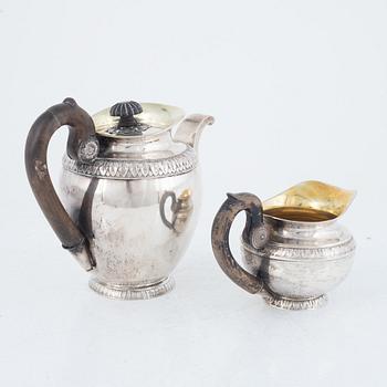 A Polish Silver Teapot and Creamer, Warsaw, 19th Century.