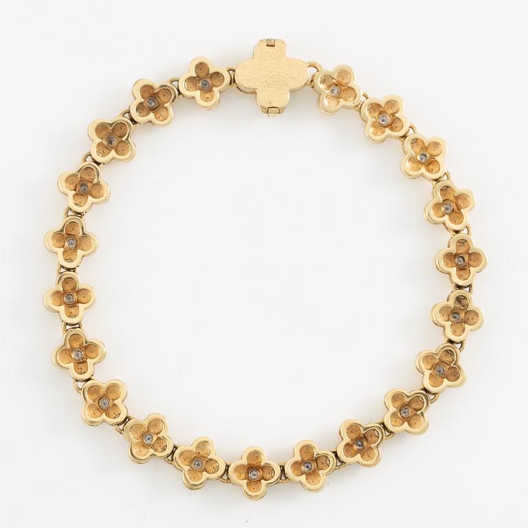 Armband, 18K guld med briljantslipade diamanter.