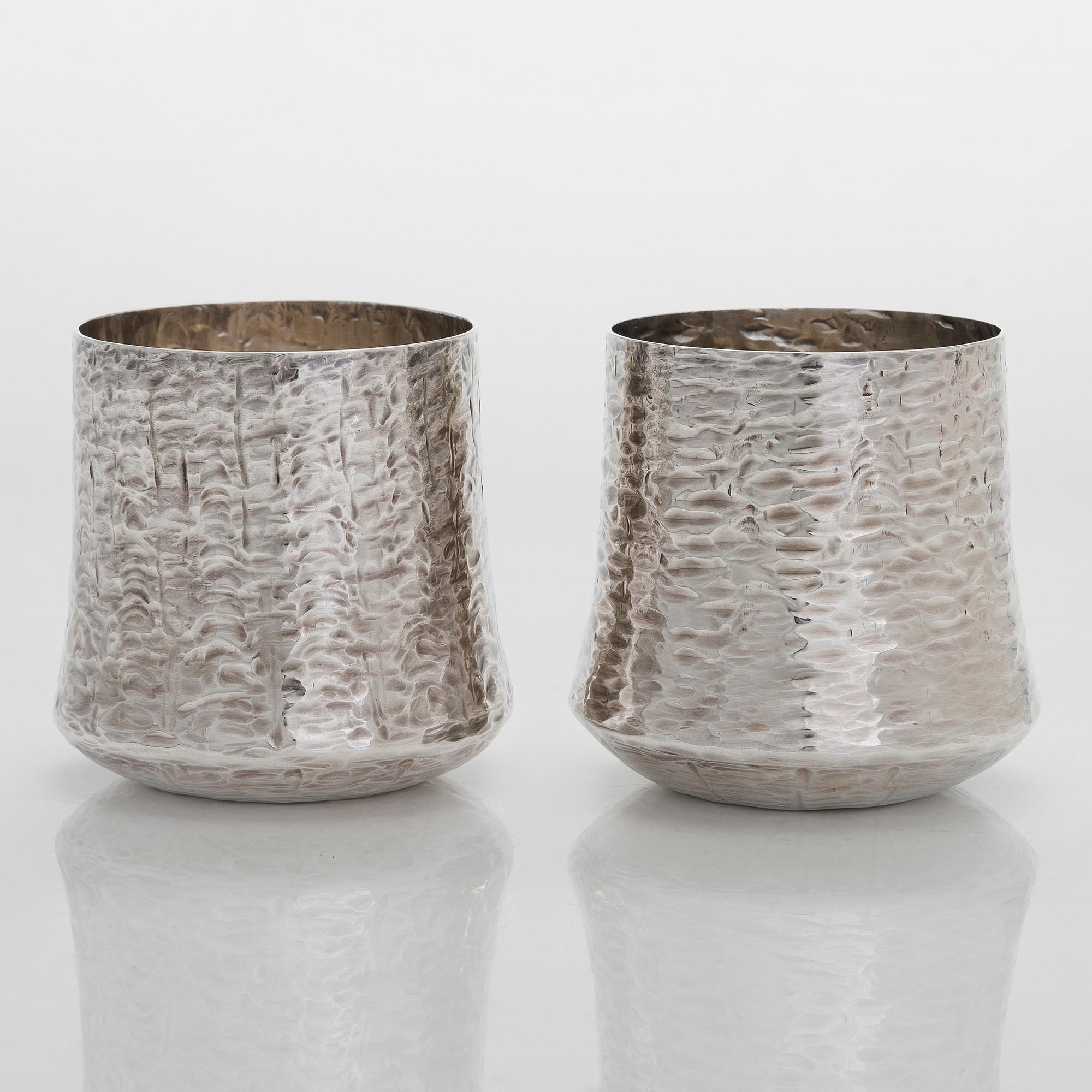 Tapio Wirkkala, a sterling silver pitcher with eight beakers, Hämeenlinna Finland 1973-1978.