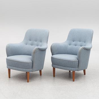 Carl Malmsten, a pair of "Samsas" armchairs, O.H. Sjögren, Sweden, 1987.