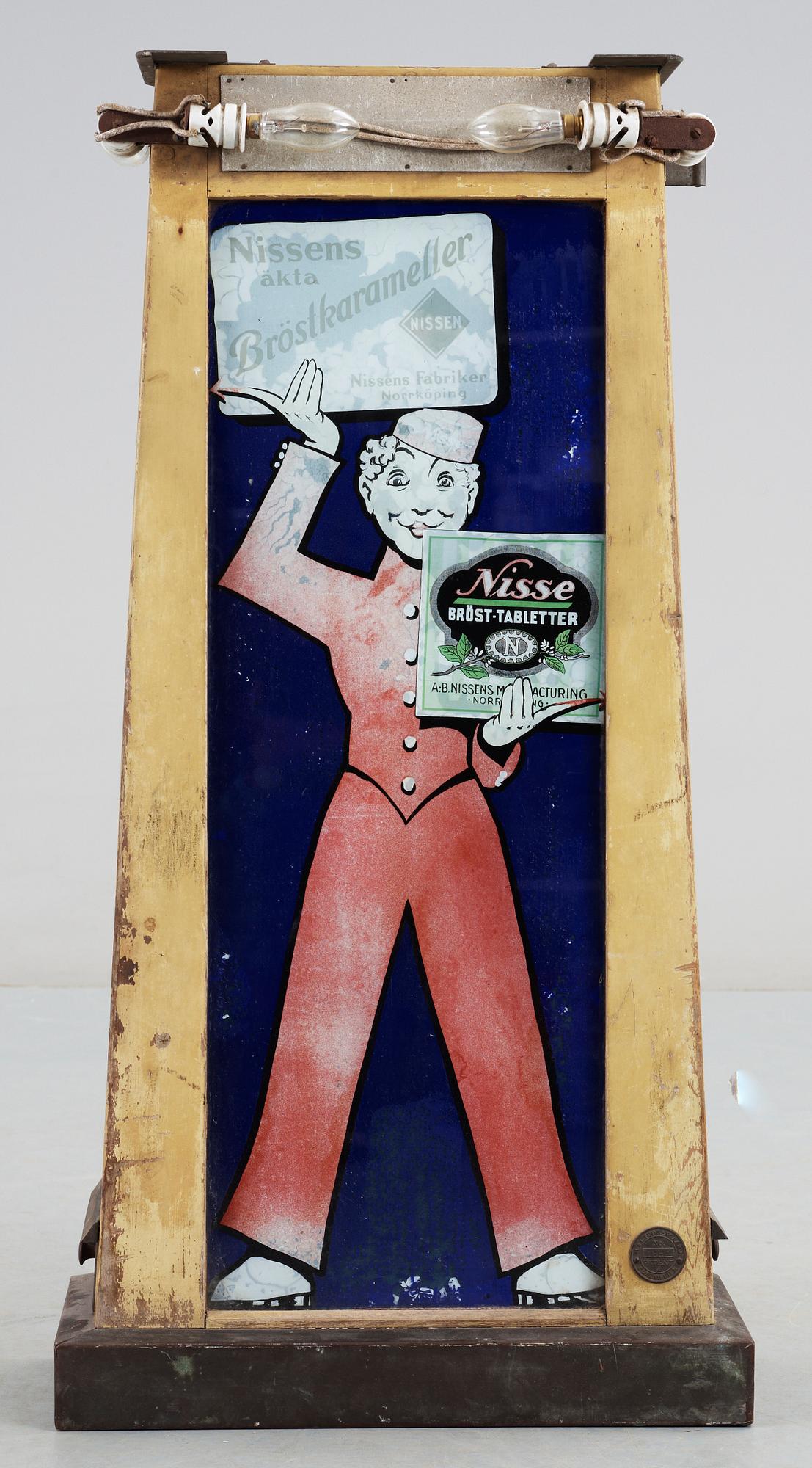 GODISAUTOMAT, "Nisses äkta bröstkarameller", M & L Thorengard, Köpenhamn, 1920/30-tal.