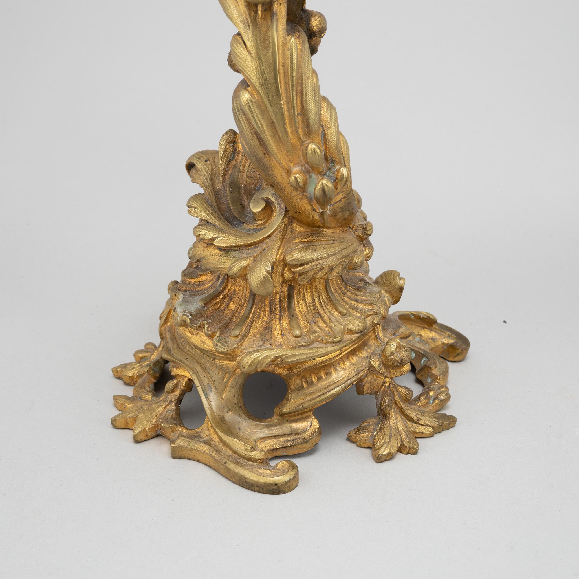 A pair of bronze candelabras. End of the 19th Century.