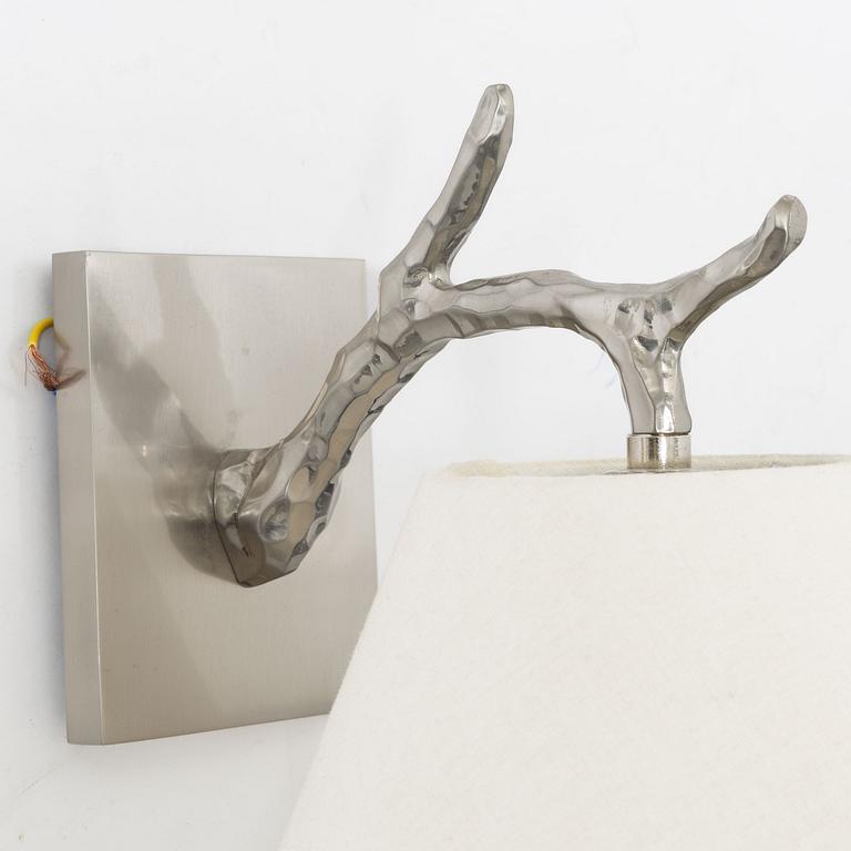 A pair of 'Twig Down' wall lamps, Vaughan, United Kingdom.