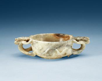 A carved nephrite ceremonial wine cup, late Qing dynasty.