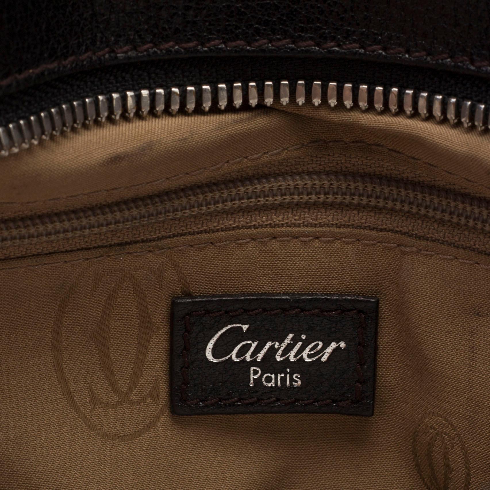 A bag "Marcello Reporter" by Cartier.