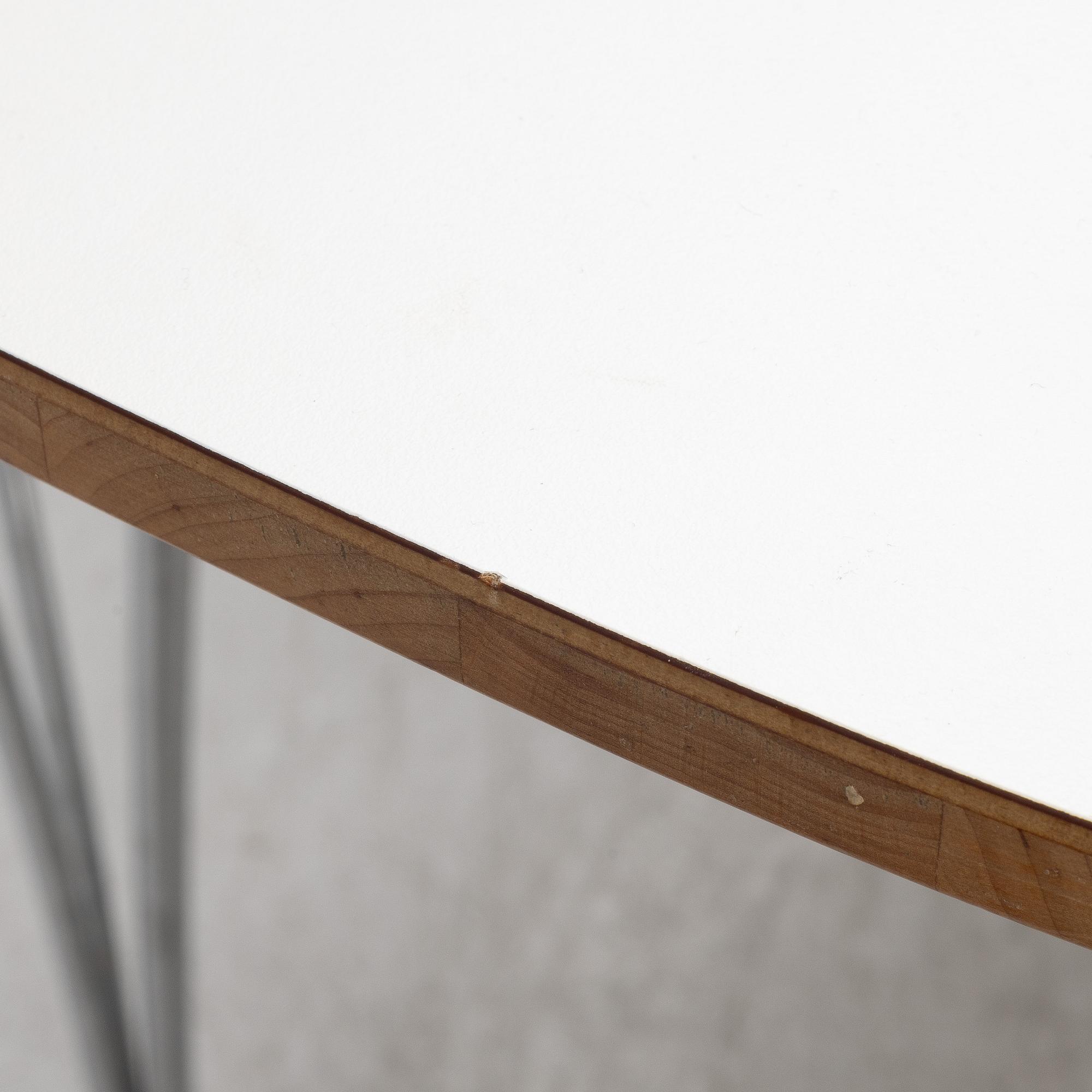 Bruno Mathsson & Piet Hein, dining table, "Superellipse", Fritz Hansen, Denmark, 2006.
