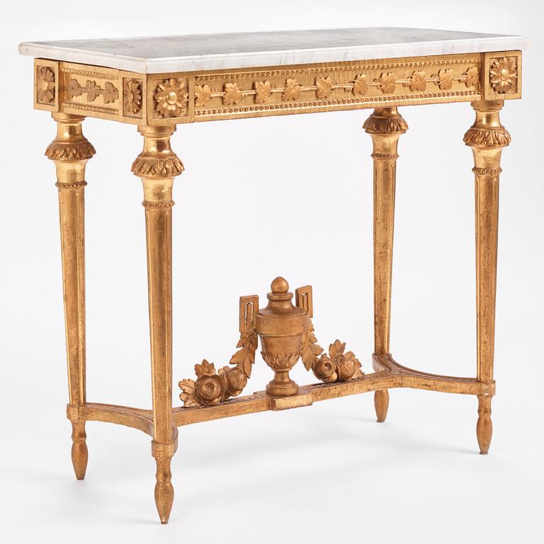 A Gustavian carved giltwood and marble console by O. C. Lindmark (master in Stockholm 1779-1813).