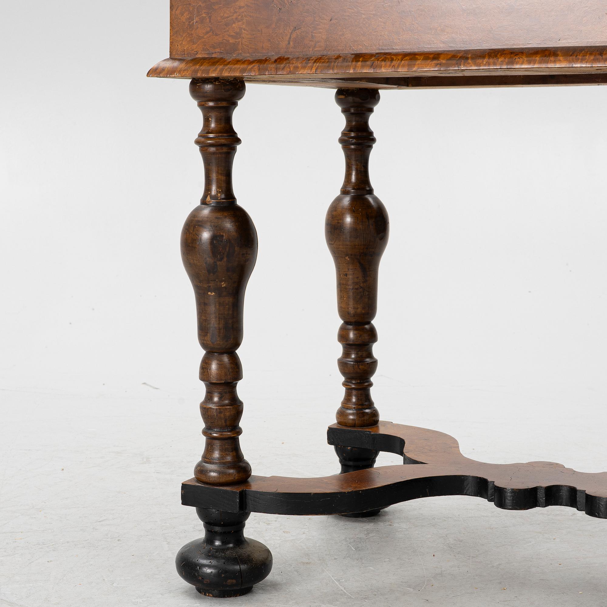 A Swedish late Baroque burr-alder table, first part 18th century.