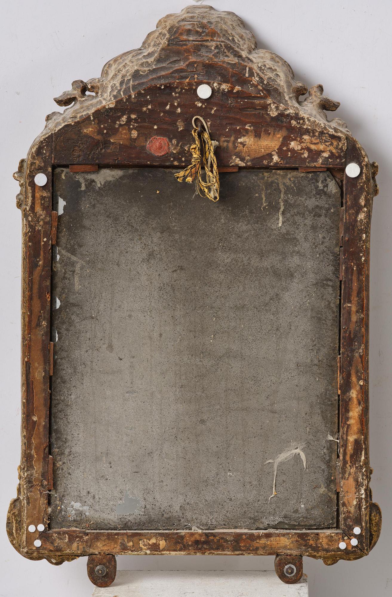 A two-branch giltwood rococo girandole mirror, Stockholm, later part 18th century.