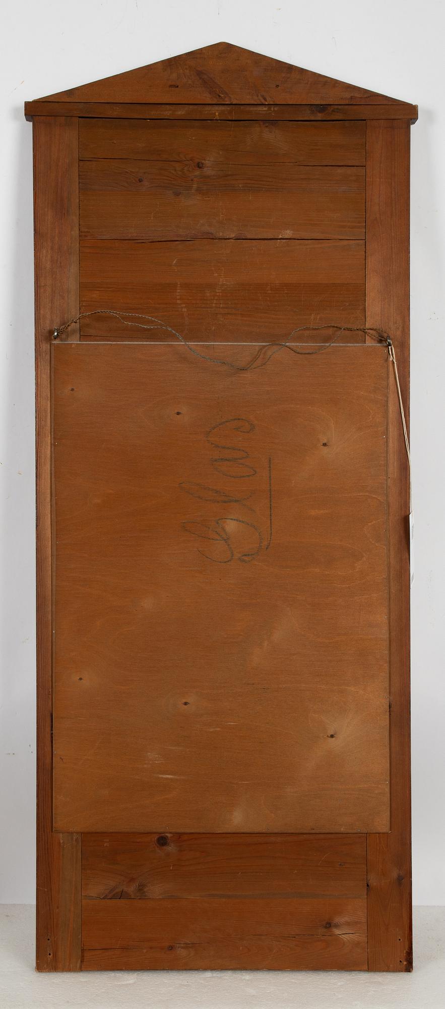 An Empire mirror, first half of the 19th Century.