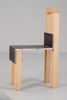 A Jonas Bohlin 'Sto' iron and oak chair, Stockholm 1990.