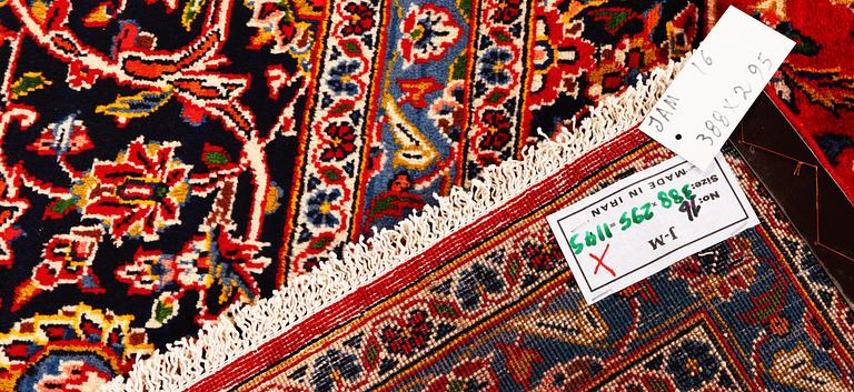 A Kashan carpet, c. 388 x 295 cm.