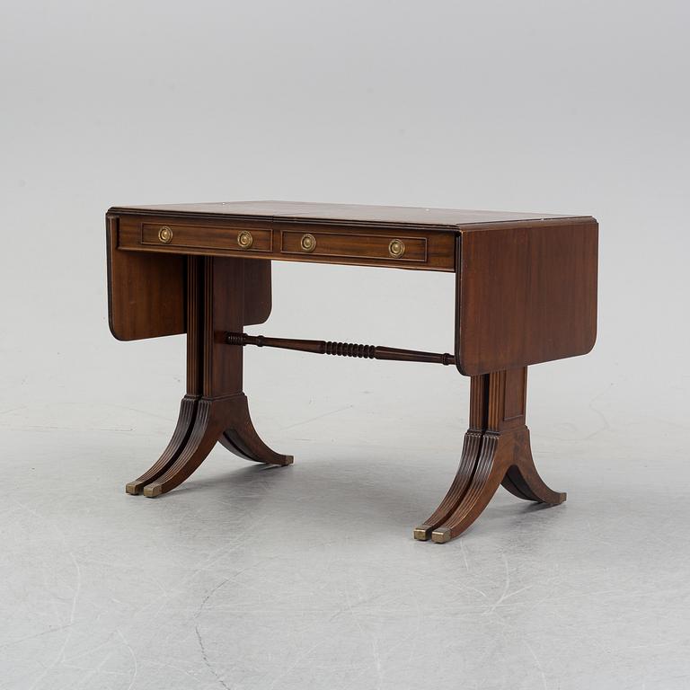 A mahogany dining table with folding and additional leaves, Nordiska Kompaniet, designed 1945.