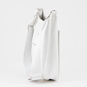 HERMÈS, a white leather shoulderbag, "Evelyn".