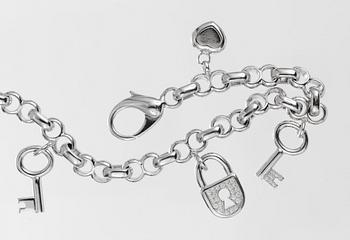 BRACELET, Chopard, five charms in the shape of heart, keys and locket.