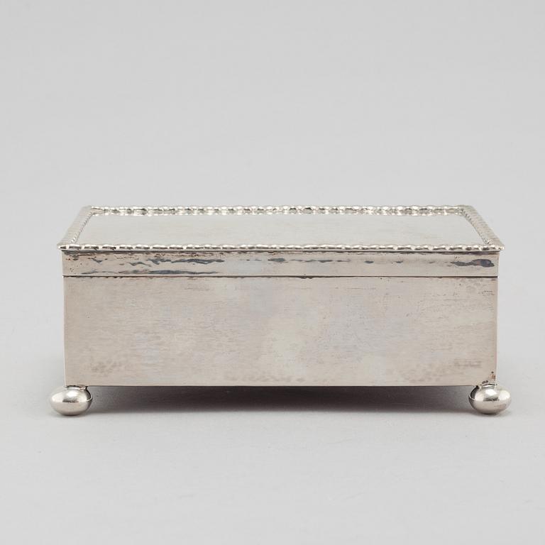 A silver cigar box from K Andersson in Stockholm, 1917.